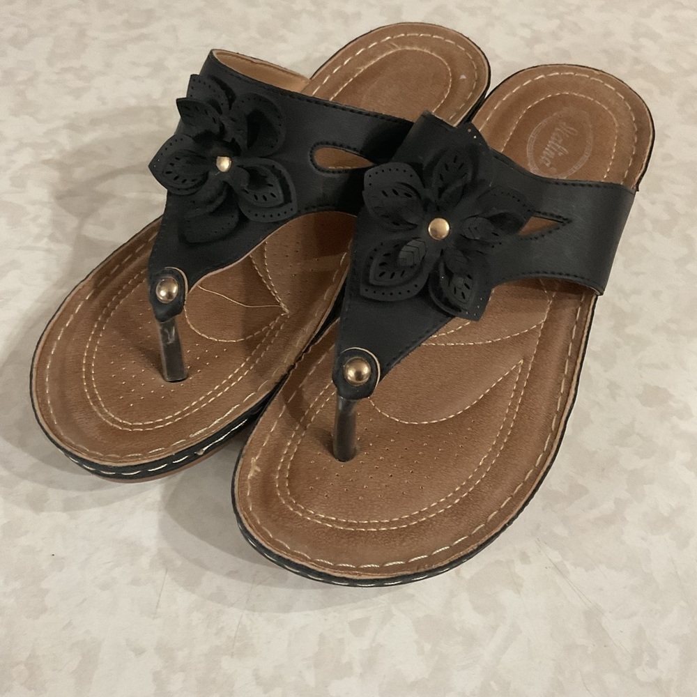 Italina Black Floral Thong Sandals with Gold Accents. Size 9/ 39